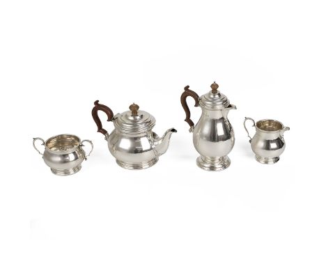 Goldsmiths &amp; Silversmiths Company Ltd, four piece tea/coffee set, comprising, teapot H16.5cm, coffee pot H23cm, both with