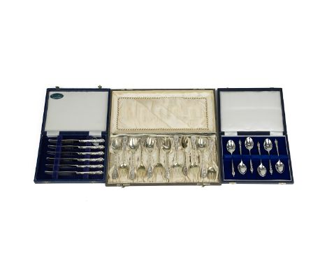 Silver cased flatware, to include a cased set of 10 silver gilt forks, with beaded stems and floral decorated finials stamped