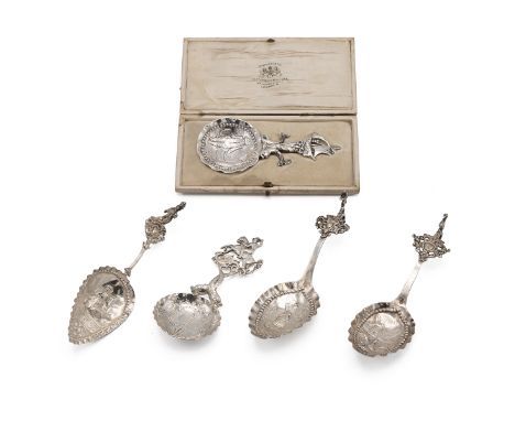 Silver caddy spoons - five assorted Dutch and English spoons with various Dutch scenes to the bowls various makers and hallma