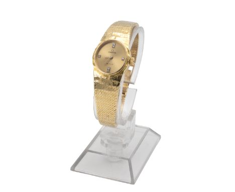 Vintage Lady's Omega De Ville 18ct yellow gold wristwatch. Manual wind, 20mm case, gold dial with diamond quarter markers and