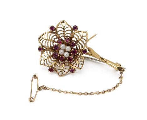 18ct gold, ruby and cultured pearl stylised flower brooch, 4.9 cm long, 11.8 grams gross.
