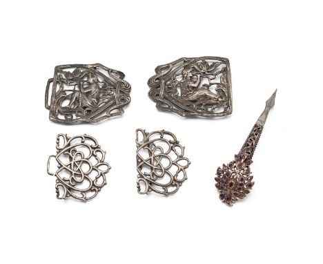 Ruby set eastern brooch; with an Art Nouveau style modern two piece silver belt buckle; and another silver belt buckle.