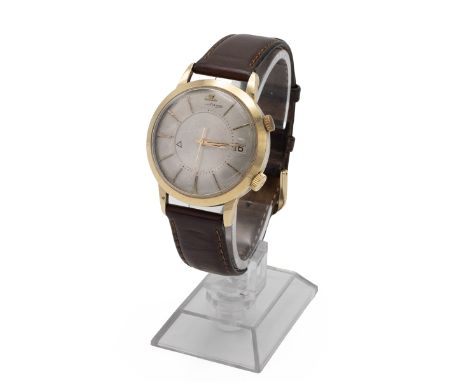 Vintage gentleman's Jaeger-LeCoultre Memovox wristwatch. 37mm gold plated case, silvered dial, baton hour markers, automatic 