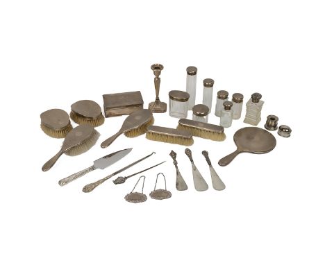 Silver dressing table sets, including silver back brushes, mirror, pin jars, cigarette box, drinks table, inkwell, shoe horns
