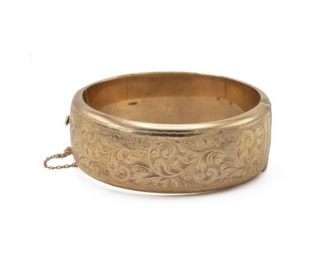 9ct gold half engraved hinged bangle, inner diameter 6.1 cm, 48 grams gross.