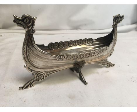  Sale Item:    SCANDANAVIAN WHITE METAL LONG BOAT  Vat Status:   No Vat   Buyers Premium:  This lot is subject to a Buyers Pr