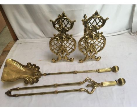 Sale Item:    2 BRASS FIRE DOGS TONGS &amp; SHOVEL   Vat Status:   No Vat   Buyers Premium:  This lot is subject to a Buyers