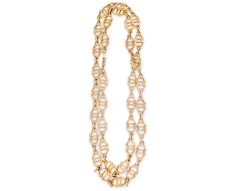 Christian-Dior-Vintage-Modeschmuck-Halskette  Metall mit Altgoldfinish. Aus 35 doppelten, verschlungenen Fünfecken, die Buchs
