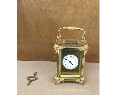 Antique Brass repeating Carriage Clock, ticking with key, but does not chime.