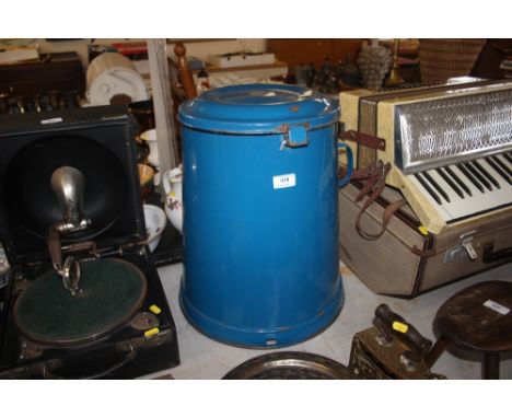 An enamel flour sifter bin