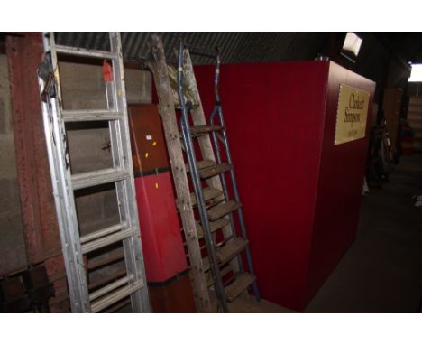 A wooden and metal step ladder and a wooden step ladder