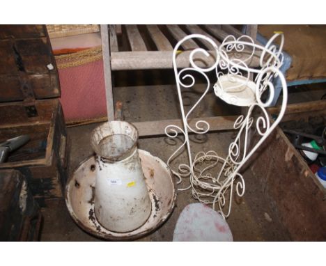 An enamel bowl and jug together with a metal plant holder 