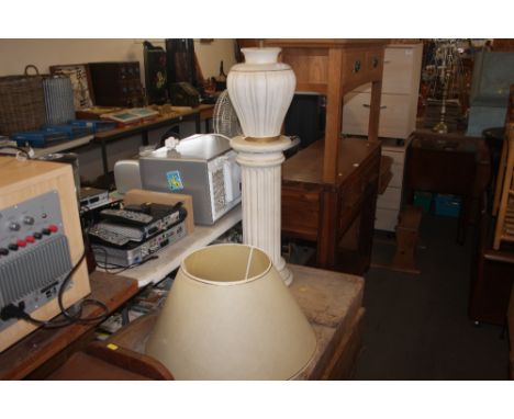 A floor standing lamp and shade