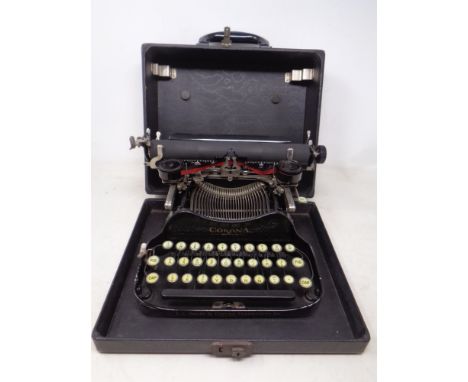 A vintage L C Smith &amp; Corona typewriter in case.