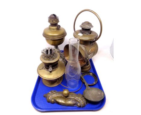 A tray containing antique metalware including oil lamps, a French lantern by G. Ducellier of Paris, plated ladle etc.