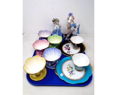 A tray containing two Windsor bone china tea cups with tea plates, Leonardo Collection and Nao figures together with a set of