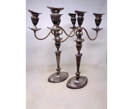 A pair of 19th century Old Sheffield Plate three-sconce table candelabra (height 43.5cm).