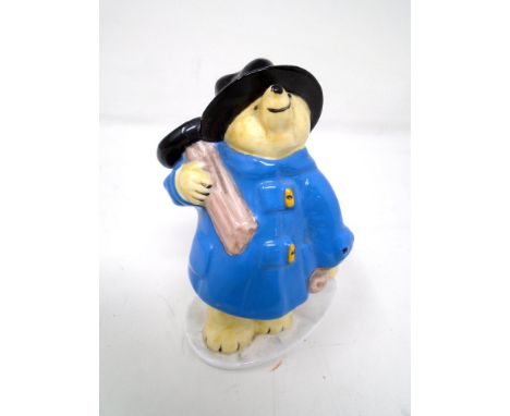 A Coalport figure, Paddington the chimney sweep.
