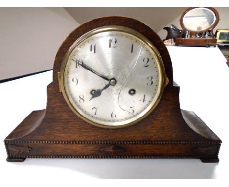 A 1930's oak cased 8-day mantel clock with silvered dial (a/f)