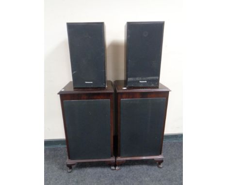 A pair of inlaid mahogany effect speaker cabinets together with a pair of Panasonic speakers.