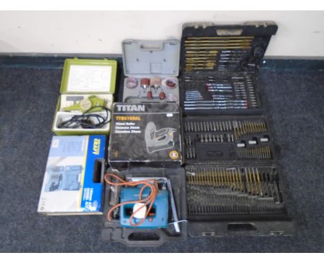 A box containing assorted boxed and cased toolkits, drill bits, Titan nailer, Powercraft chisel kit etc.