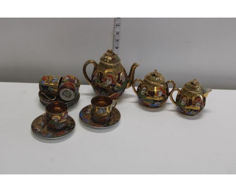 A hand painted Japanese porcelain tea service 