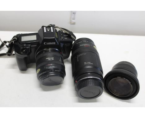 A Canon EOS 650 camera with a Canon EF 70-210mm 1:4 lens &amp; two other 