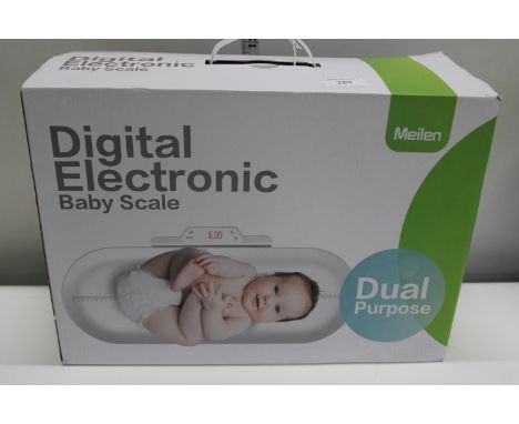 A boxed Meilen electronic baby scale 