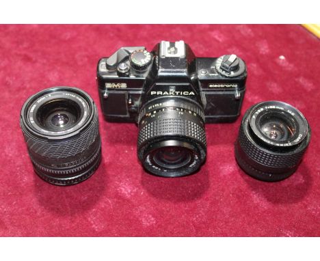 A Praktica BMS electronic camera body &amp; two Carl Zeiss lenses &amp; one Sigma lens 