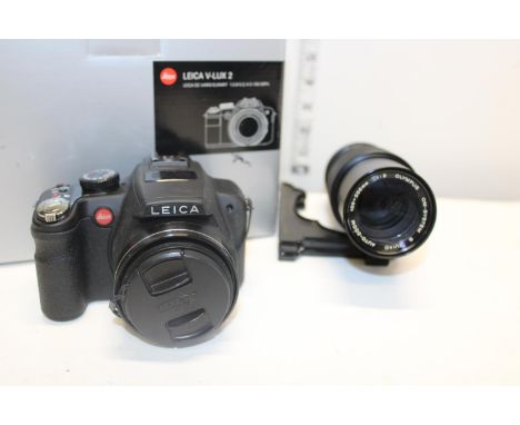 A boxed Leica camera &amp; lens 