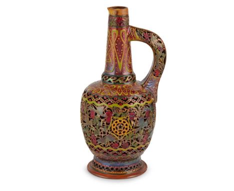 ZSOLNAY, PÉCS PERSIAN STYLE PITCHER VASE, CIRCA 1895 'eosin' lustre-glazed ceramic, pierced and relief-moulded, impressed ZSO