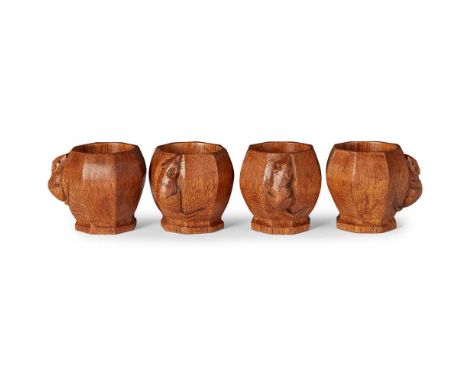 ROBERT ‘MOUSEMAN’ THOMPSON (1876-1955) SET OF FOUR EGG CUPS, CIRCA 1960's-70's oak, each with carved mouse signatureDimension