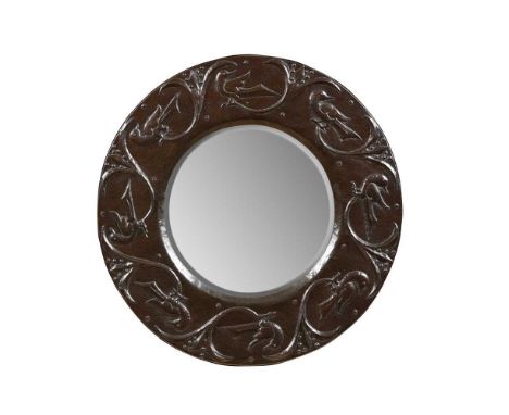 JOHN PEARSON (1859-1930) ARTS & CRAFTS WALL MIRROR, CIRCA 1900 repoussé-decorated copperDimensions:40cm diameter