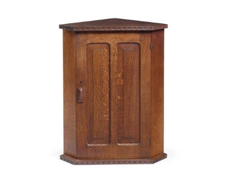 STANLEY WEBB DAVIES (1894–1978) ARTS & CRAFTS CORNER CABINET, 1933 oak, with carved maker's mark, cabinet maker's mark and da