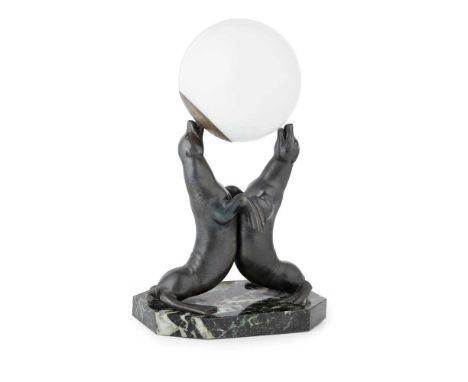 LOUIS-ALBERT CARVIN (1875-1951) ART DECO LAMP, CIRCA 1930 patinated metal, glass, marble, cast as a sea lion lamp, signed CAR