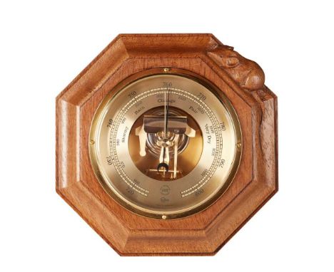 ROBERT ‘MOUSEMAN’ THOMPSON (1876-1955) BAROMETER, 1970's oak, with carved mouse signature, brass cased barometerDimensions:21