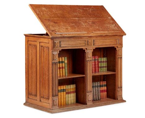 ATTRIBUTED TO GILLOW & CO., LANCASTER GOTHIC REVIVAL FREESTANDING BOOKCASE, MID-19TH CENTURY oak, the hinged top with a ratch