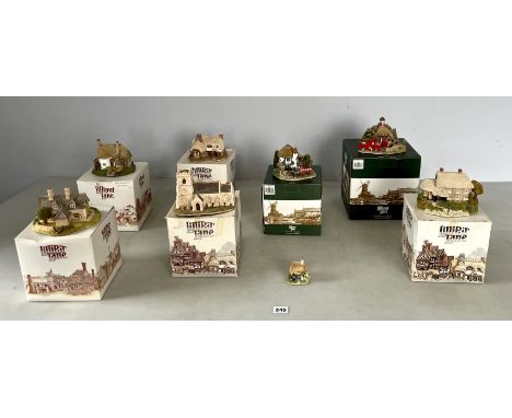 7 boxed Lilliput Lane cottages - Bow Cottage, Spring Gate Cottage, St. Mary's, Ostlers Keep, The Drayman, Fireman's Watch, Li