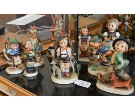 Ten Goebels Hummel figures of children, 9.5-13.5 cm high 