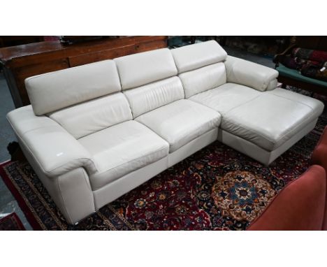 An Italian off-white leather corner sofa in two sections, with adjustable head rests, on chrome feet, 296 cm w x 105 cm 