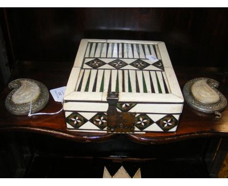 An unusual antique bone box, together with a pair of carved mother-of-pearl cloak clasps CONDITION REPORT.
