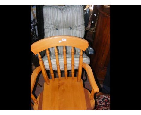 A light wood Captain's chair, together with a garden lounger 