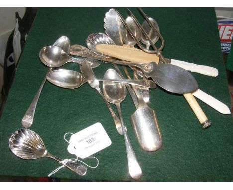 A silver caddy spoon, together with other flatware 