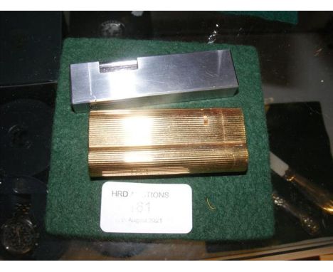 A Dunhill lighter and one other 