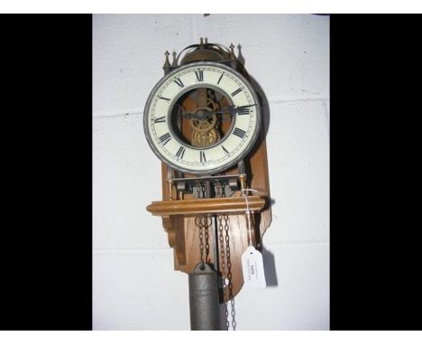 A modern lantern style wall clock 