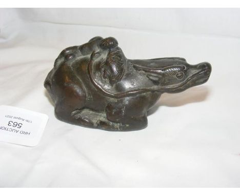 A Chinese bronze model of water buffalo with sleeping figure atop - 12cm long CONDITION REPORTBy our judgement, condition of 