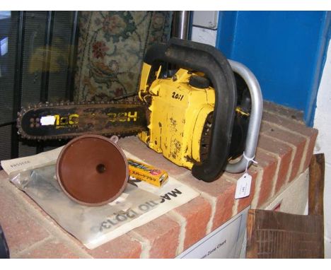 A Mac petrol driven chainsaw 