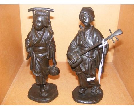 A pair of antique bronze oriental figures - 26cm high 