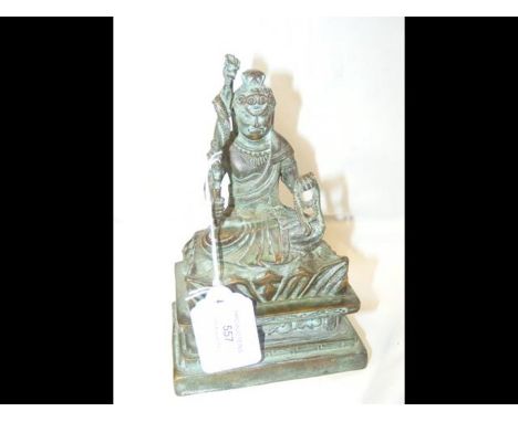 An early Indo Chinese bronze seated on throne-like structure - 17cm high 