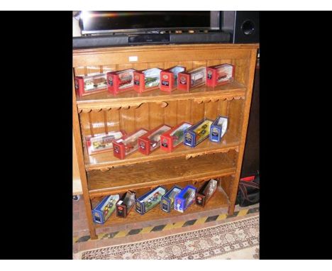An four shelf oak bookcase - width 107cms